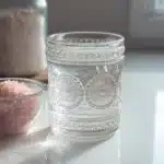 Elegant glass of water with pink Himalayan salt - pink salt weight loss recipe