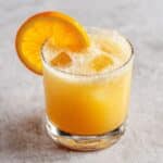Bright cortisol cocktail for weight loss with fizz and orange garnish